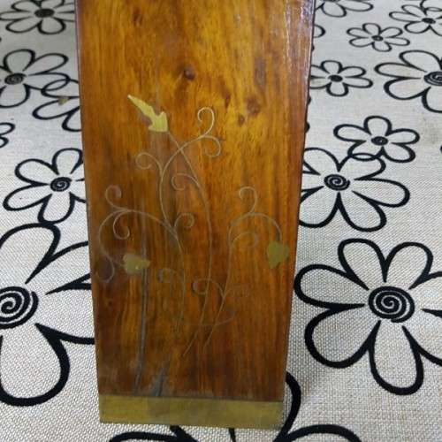 A wonderful vintage Moroccan "Camel Saddle" ottoman stool with stunning brass inlay detailing