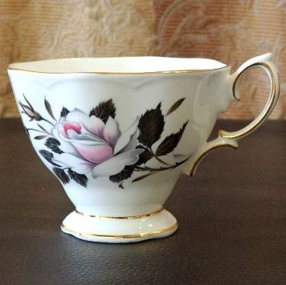An incredible vintage Royal Albert fine bone china "Queen's Messenger" collection trio