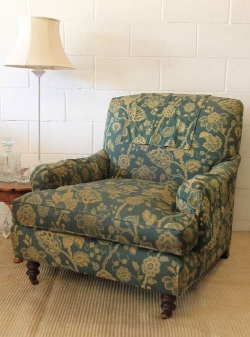 A beautiful "oversized" comfortable vintage arm chair on its original castors in fabulous condition