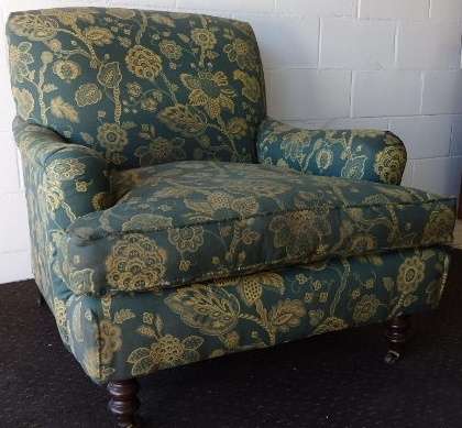 A beautiful "oversized" comfortable vintage arm chair on its original castors in fabulous condition