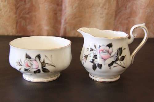 A stunning Royal Albert "Queen's Messenger" series fine bone china milk jug & sugar bowl set