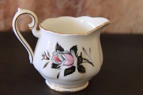 A stunning Royal Albert "Queen's Messenger" series fine bone china milk jug & sugar bowl set