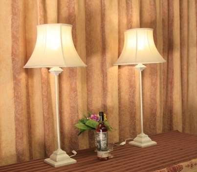 Two beautiful and elegant "tall" occasional table/ bedside lamps with white shades bid/lamp