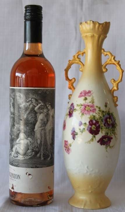 A gorgeous tall German-porcelain vase with scroll handles, flared rim and transfer print flowers