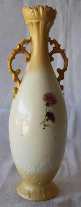 A gorgeous tall German-porcelain vase with scroll handles, flared rim and transfer print flowers