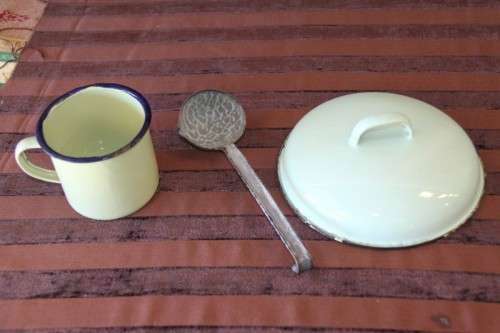 An awesome collection of enamel ware, mug, spoon, perfect for the lapa/braai area