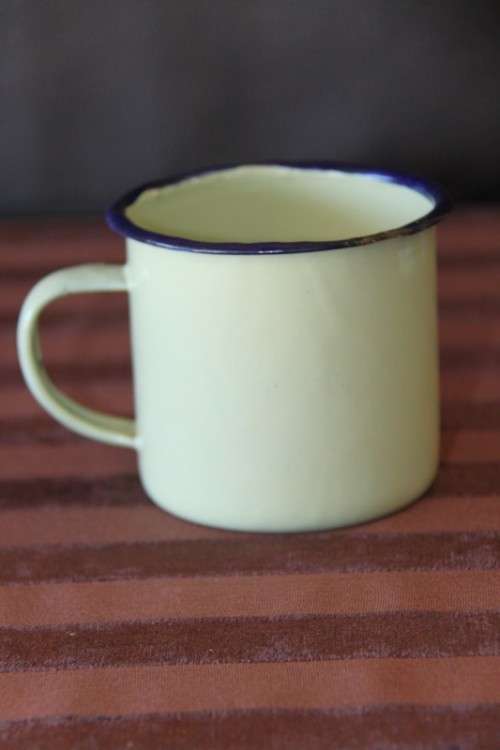 An awesome collection of enamel ware, mug, spoon, perfect for the lapa/braai area