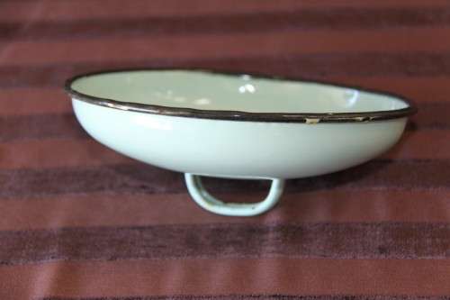 An awesome collection of enamel ware, mug, spoon, perfect for the lapa/braai area