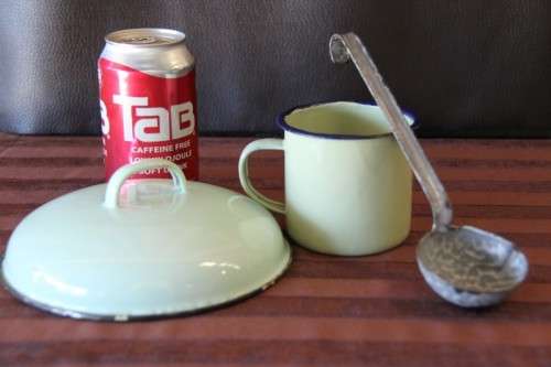 An awesome collection of enamel ware, mug, spoon, perfect for the lapa/braai area