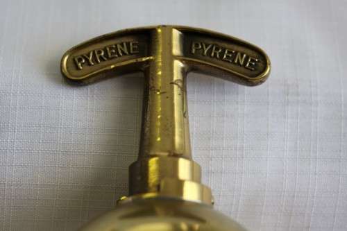 An incredible original antique (c1928) Solid brass "The Pyrene Company Ltd" fire extinguisher