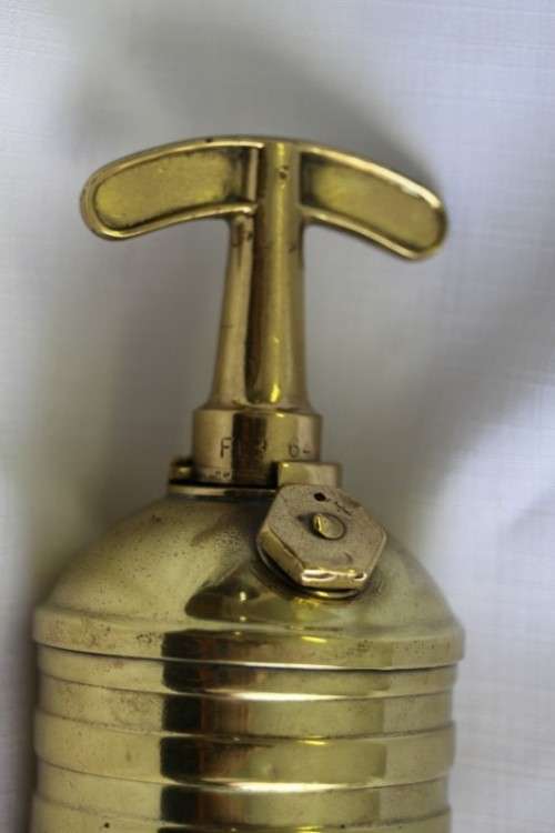 An incredible original antique (c1928) Solid brass "The Pyrene Company Ltd" fire extinguisher