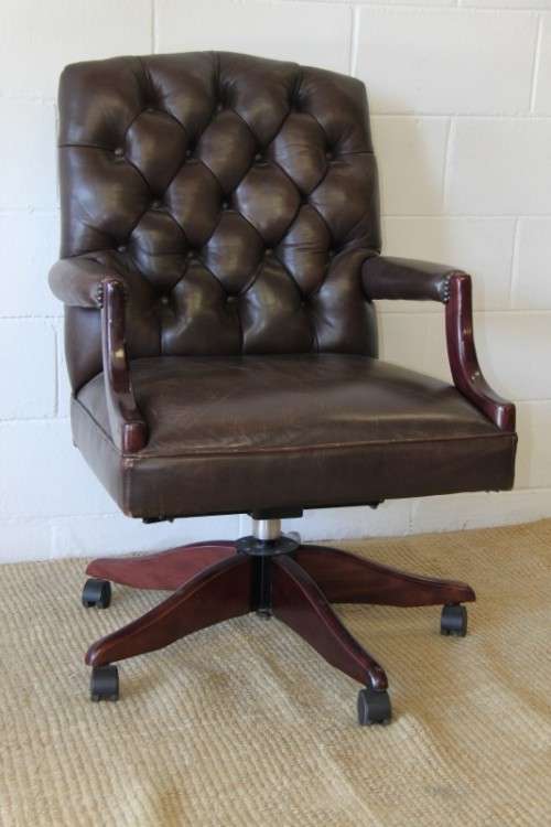 An amazing leather Chippendale style Executives (tilt and swivel) office chair in great condition!!!