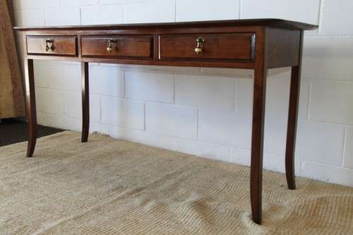 Spectacular teak buffet console/hall table with three spacious drawers in remarkable condition