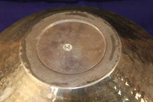 A beautiful large round "hand chased" metal bowl - made in India; in very good condition