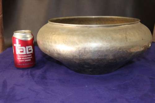 A beautiful large round "hand chased" metal bowl - made in India; in very good condition