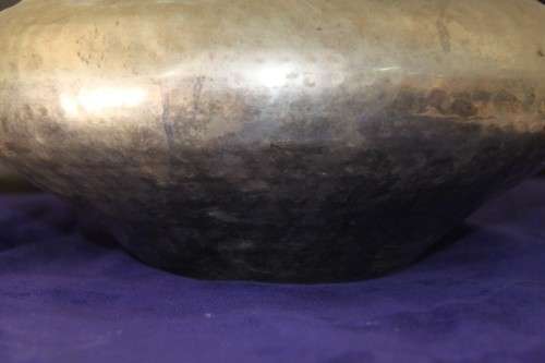A beautiful large round "hand chased" metal bowl - made in India; in very good condition