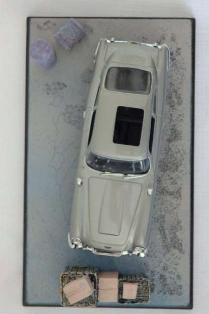 An awesome James Bond 007 "Aston Martin DB5'' die cast model car from the movie "Goldfinger''