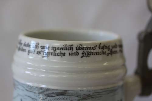 An awesome vintage white German made ceramic (lidded) Stein with "Munich" related transfer prints
