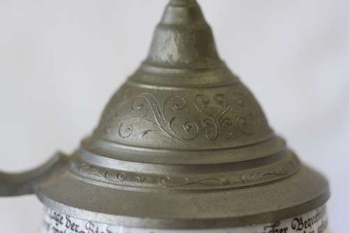 An awesome vintage white German made ceramic (lidded) Stein with "Munich" related transfer prints