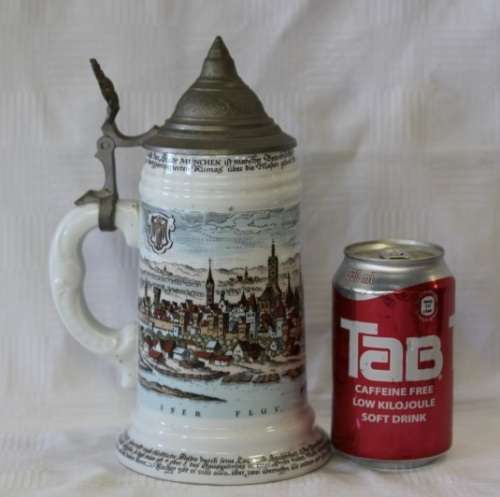An awesome vintage white German made ceramic (lidded) Stein with "Munich" related transfer prints