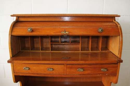 An incredible vintage solid oak roll top writing bureau with pull out writing top - very compact!