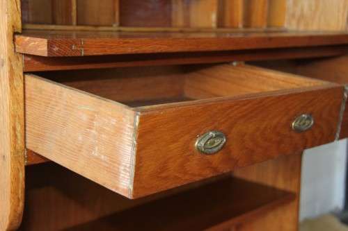 An incredible vintage solid oak roll top writing bureau with pull out writing top - very compact!