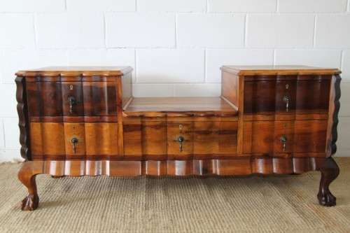 A fabulous, elegant and solid stinkwood ball & claw dresser with five drawers and carved trimmings
