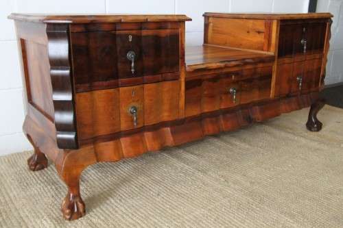 A fabulous, elegant and solid stinkwood ball & claw dresser with five drawers and carved trimmings