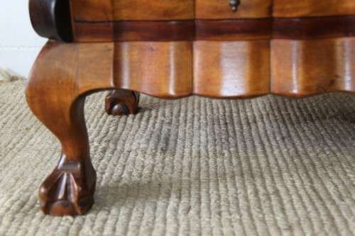 A fabulous, elegant and solid stinkwood ball & claw dresser with five drawers and carved trimmings