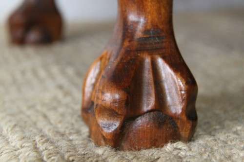 A fabulous, elegant and solid stinkwood ball & claw dresser with five drawers and carved trimmings