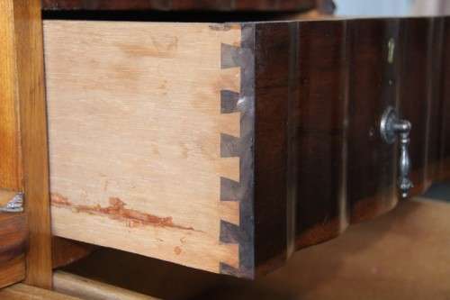 A fabulous, elegant and solid stinkwood ball & claw dresser with five drawers and carved trimmings