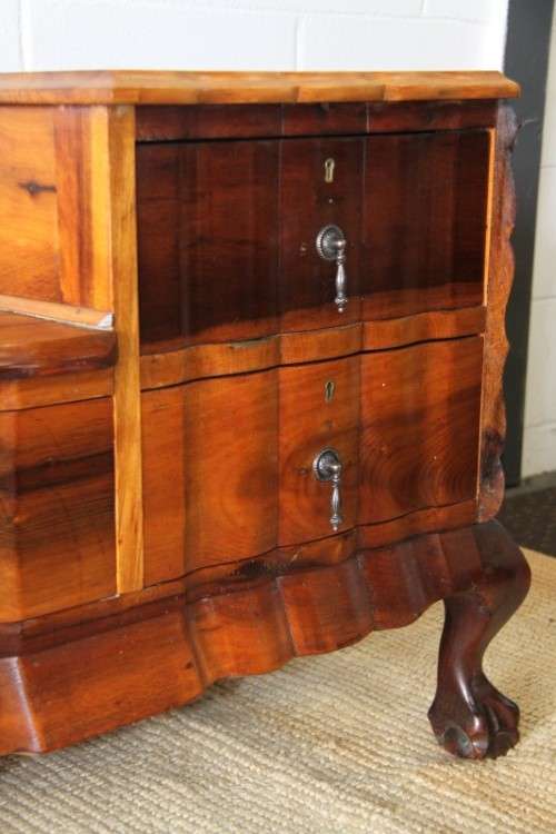 A fabulous, elegant and solid stinkwood ball & claw dresser with five drawers and carved trimmings