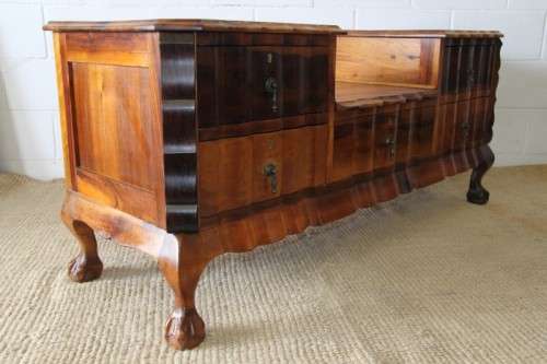 A fabulous, elegant and solid stinkwood ball & claw dresser with five drawers and carved trimmings