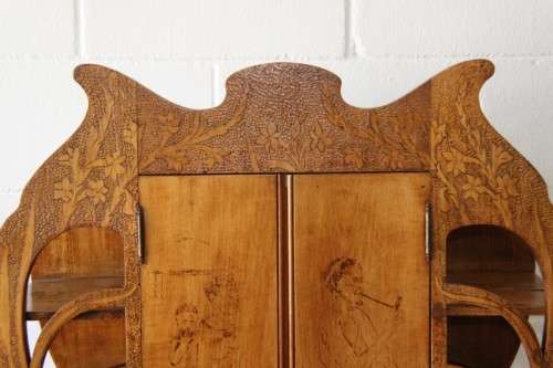An incredible rare antique German Art Nouveau Apothecary wall cabinet with stunning carved detailing
