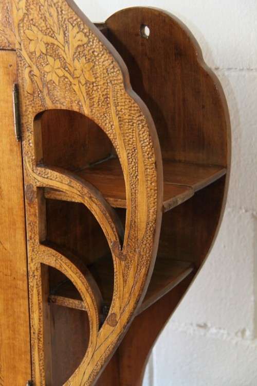 An incredible rare antique German Art Nouveau Apothecary wall cabinet with stunning carved detailing