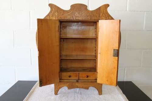 An incredible rare antique German Art Nouveau Apothecary wall cabinet with stunning carved detailing