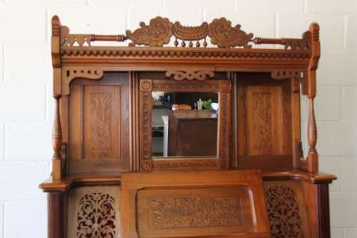 A spectacular rare antique Victorian (1902 - 1920) Newman Bros high back parlor reed organ