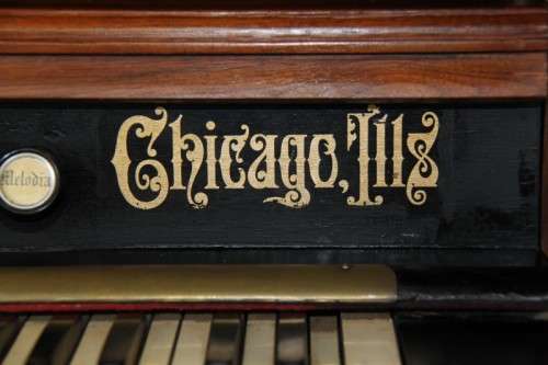 A spectacular rare antique Victorian (1902 - 1920) Newman Bros high back parlor reed organ