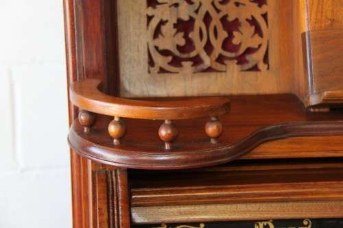 A spectacular rare antique Victorian (1902 - 1920) Newman Bros high back parlor reed organ