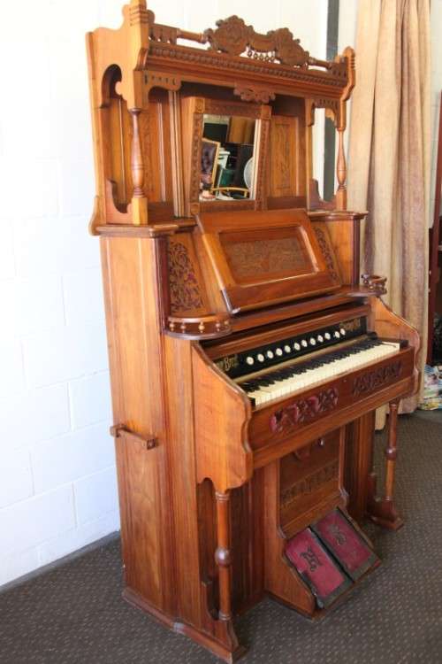A spectacular rare antique Victorian (1902 - 1920) Newman Bros high back parlor reed organ