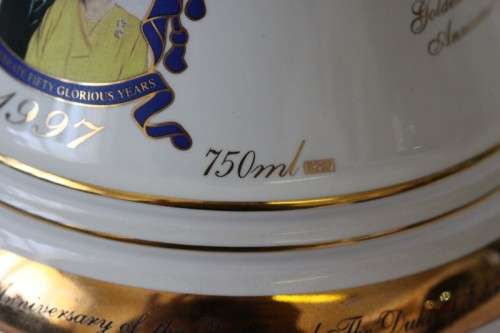 An exceptionally rare "Bells 8 year" Queen Elizabeth's 50th Anniversary commemorative decanter