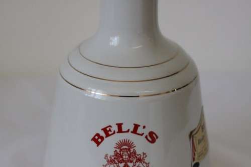 A rare 1984 "Bells Blended Scotch Whisky" Birth of Prince Henry (sealed) commemorative decanter