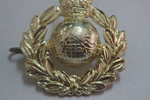 A Fantastic British "The Royal Marines" Cap Badge with Kings Crown
