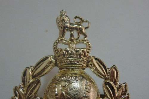 A Fantastic British "The Royal Marines" Cap Badge with Kings Crown