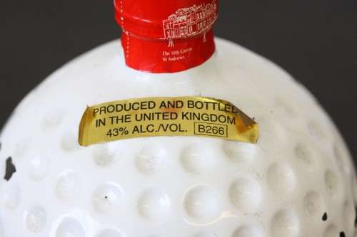 A rare SEALED vintage "Old St. Andrews" Scotch Whisky "Red-top" golf ball whisky decanter