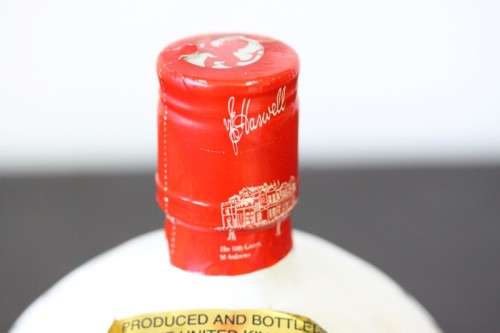A rare SEALED vintage "Old St. Andrews" Scotch Whisky "Red-top" golf ball whisky decanter