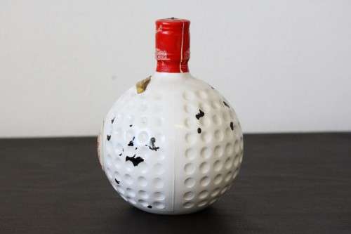 A rare SEALED vintage "Old St. Andrews" Scotch Whisky "Red-top" golf ball whisky decanter