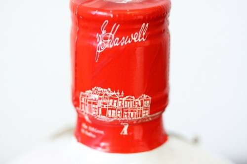 A rare SEALED vintage "Old St. Andrews" Scotch Whisky "Red-top" golf ball whisky decanter