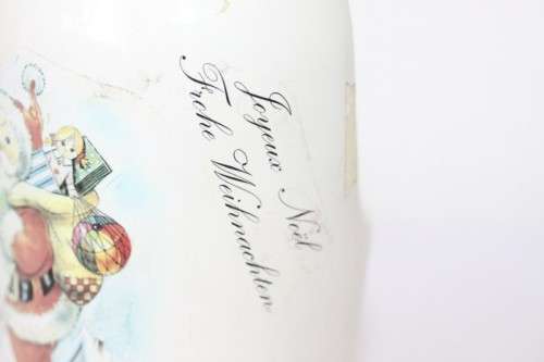 An awesome vintage German "Rauchenfelser Steinbier" porcelain Xmas commemorative flip-top decanter