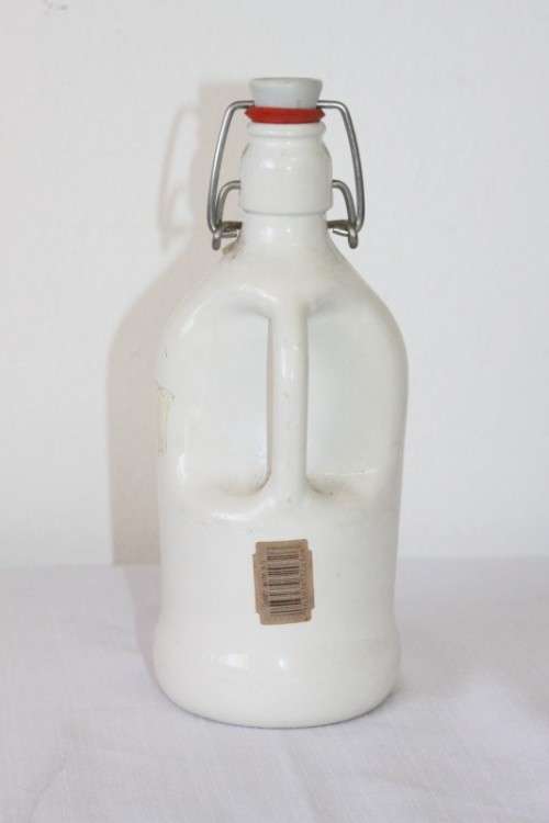 An awesome vintage German "Rauchenfelser Steinbier" porcelain Xmas commemorative flip-top decanter